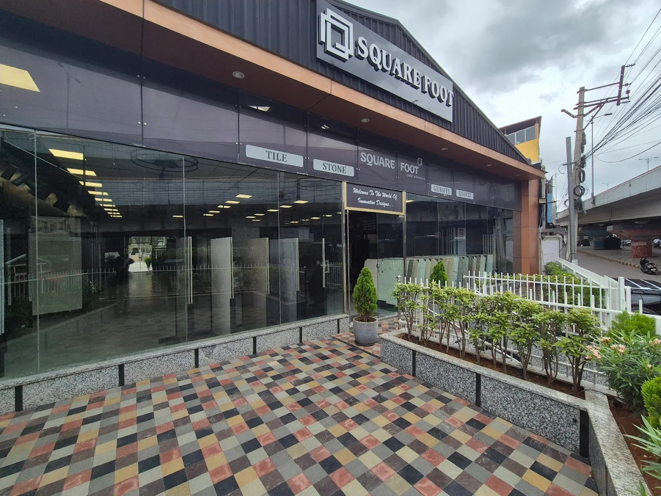 Square foot Company with Our Tiles